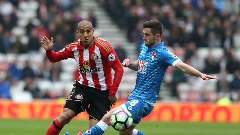 SUNDERLAND, ENGLAND - APRIL 29: Wahbi Khazri of Sunderland takes on Lewis Cook of AFC Bournemouth  during the Premier League match