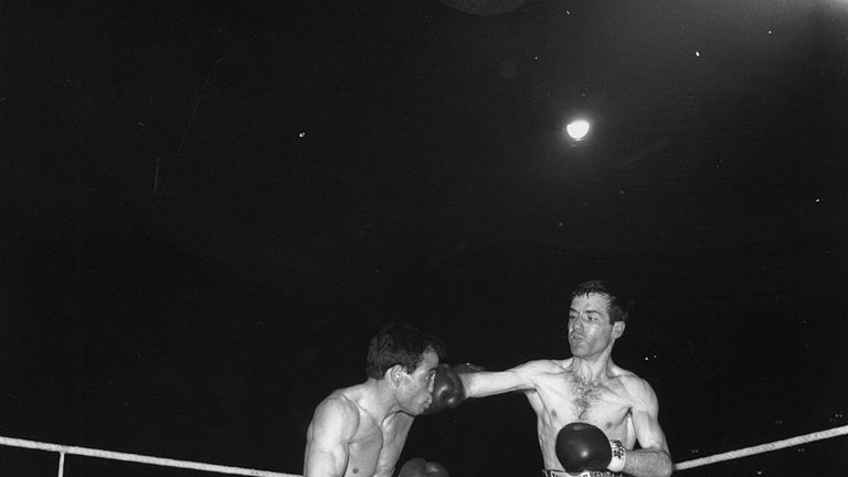 Walter McGowan, (right), and Salvatore Burruni during their world flyweight championship at Wembley, London, which McGowan went on to win.