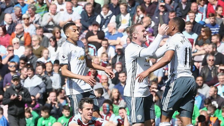 Wayne Rooney celebrates Anthony Martial's opener for Manchester United against Burnley