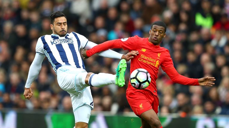 Nacer Chadli of West Bromwich Albion and Georginio Wijnaldum of Liverpool battle for possession