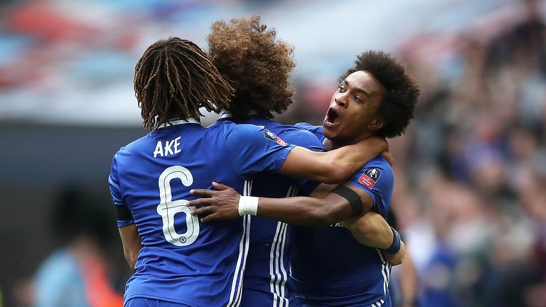 Willian celebrates with team-mates after restoring Chelsea's lead at Wembley
