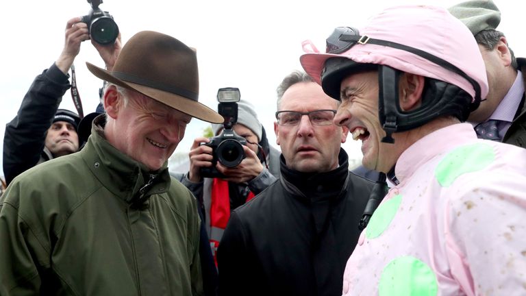 Ruby Walsh with trainer Willie Mullins following victory in the AES Champion Four Year Old Hurdle (Grade 1) (Class 1) aboard Bapaume during day five of the