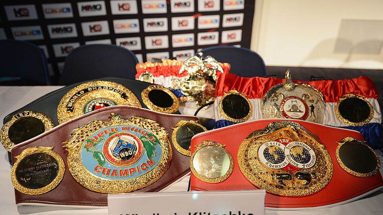 The five championship belts of  Wladimir Klitschko on display during a press conference with Wladimir Klitschko and Mariusz Wach