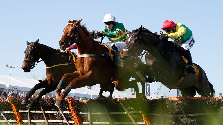 Barry Geraghty riding Yanworth (C) clears the last to win the Ryanair Stayers Liverpool Hurdle Race