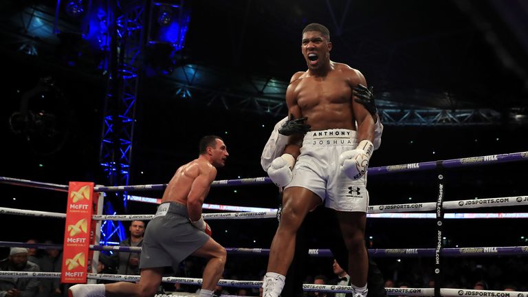 LONDON, ENGLAND - APRIL 29:  Anthony Joshua (White Shorts) puts Wladimir Klitschko (Gray Shorts) down in the 5th round during the IBF, WBA and IBO Heavywei