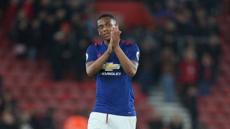 Anthony Martial applauds the travelling fans at St Mary's