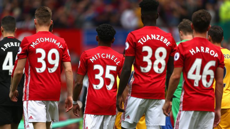 MANCHESTER, ENGLAND - MAY 21:  Manchester United players make their way out onto the pitch the Premier League match between Manchester United and Crystal P