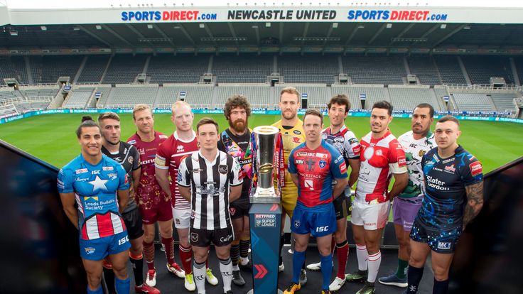 12 Super League representatives pose with the Betfred Super League trophy ahead of the Dacia Magic Weekend at St James's Park