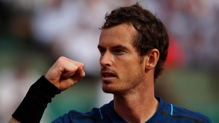 Andy Murray of Great Britain celebrates winning a point during the first round match against Andrey Kuznetsov of Russia