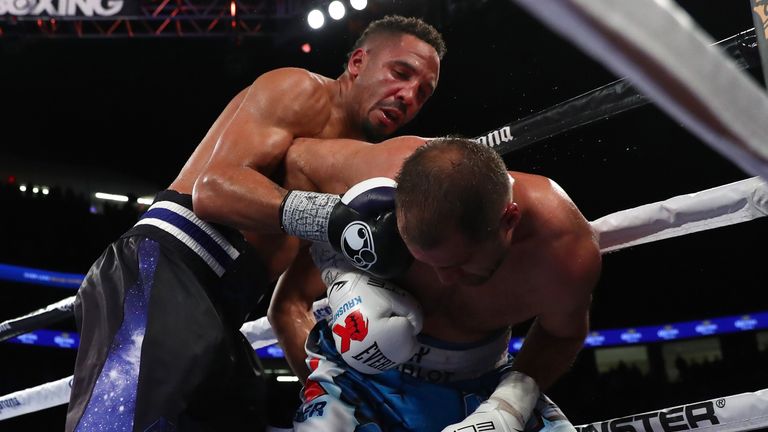 LAS VEGAS, NV - NOVEMBER 19:   (L-R) Andre Ward lands a right to the head of Sergey Kovalev of Russia during their light heavyweight title bout at T-Mobile