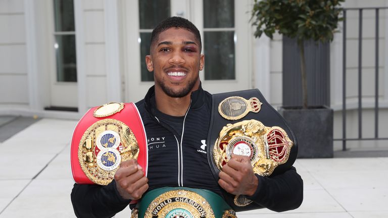 WORLD CHAMPION ANTHONY JOSHUA.PIC;LAWRENCE LUSTIG.IBF WORLD ,WBA,IBO HEAVYWEIGHT CHAMPION ANTHONY JOSHUA RELAXES AFTER HIS VICTORY