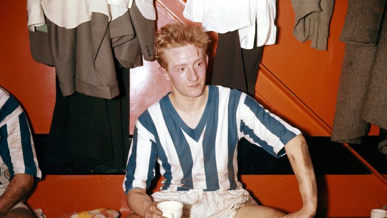 UNITED KINGDOM:  MAY 22:  Huddersfield Town player Denis Law enjoys a cup of tea after a game in 1957. 
