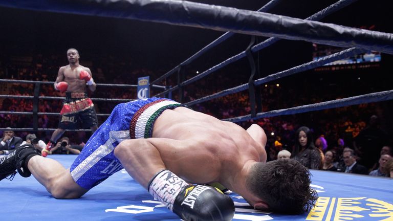 LAS VEGAS, NV - JUNE 20:  Phil Lo Greco falls onto the canvas after being knocked down by Errol Spence Jr. in the third round of their welterweight fight a