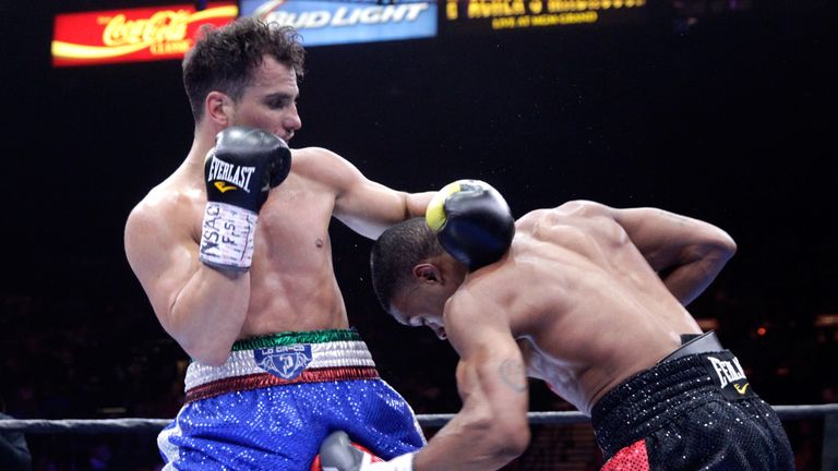 LAS VEGAS, NV - JUNE 20:  Phil Lo Greco (L) is hit by a low blow from Errol Spence Jr. during their welterweight fight at MGM Grand Garden Arena on June 20