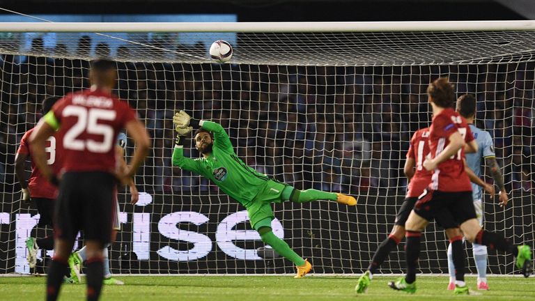 VIGO, SPAIN - MAY 04:  Sergio Alvarez of Celta Vigo fails to stop Marcus Rashford of Manchester United (not pictured) from scoring their first goal