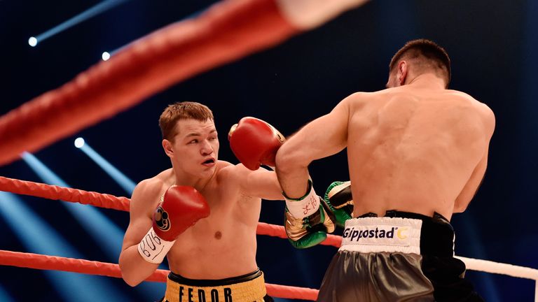 Felix Sturm of Germany throws a punch at Fedor Chudinov 