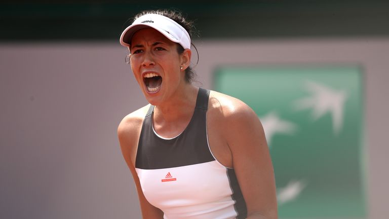 PARIS, FRANCE - MAY 29:  Garbine Muguruza of Spain celebrates winning a point during the first round match against Francesca Schiavone of Italy on day two 