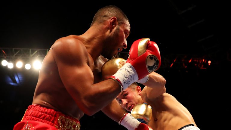LONDON, ENGLAND - SEPTEMBER 10:  Gennady Golovkin (blue trunks) and Kell Brook (red trunks) in action during their World Middleweight Title contest at The 