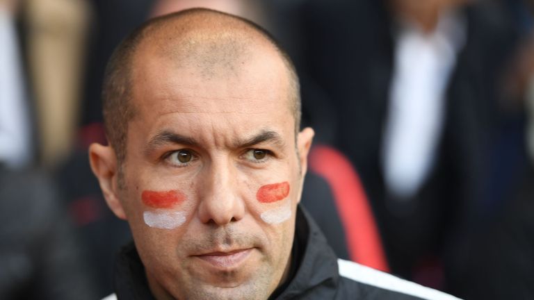 Monaco's Portuguese coach Leonardo Jardim wears his club's colours on his cheeks