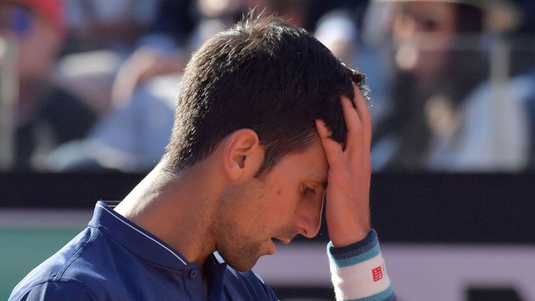 Novak Djokovic of Serbia reacts during the ATP Tennis Open final against Alexander Zverev of Germany, on May 21, 2017 at the Foro Italico  in Rome.  / AFP 