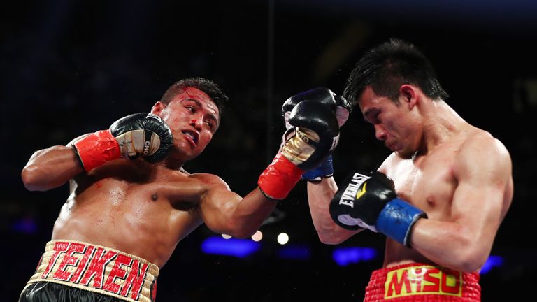 NEW YORK, NY - MARCH 18:  Roman "Chocolatito" punches Gonzalez Srisaket Sor Rungvisai  during their Championship fight for Gonzalez's WBC junior bantamweig