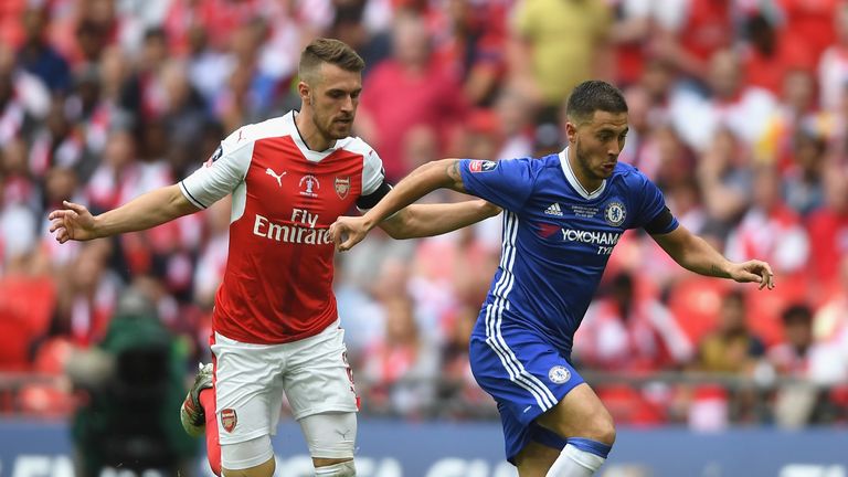Eden Hazard of Chelsea is chased down by Aaron Ramsey of Arsenal during The Emirates FA Cup Final between Arsenal and Chelsea