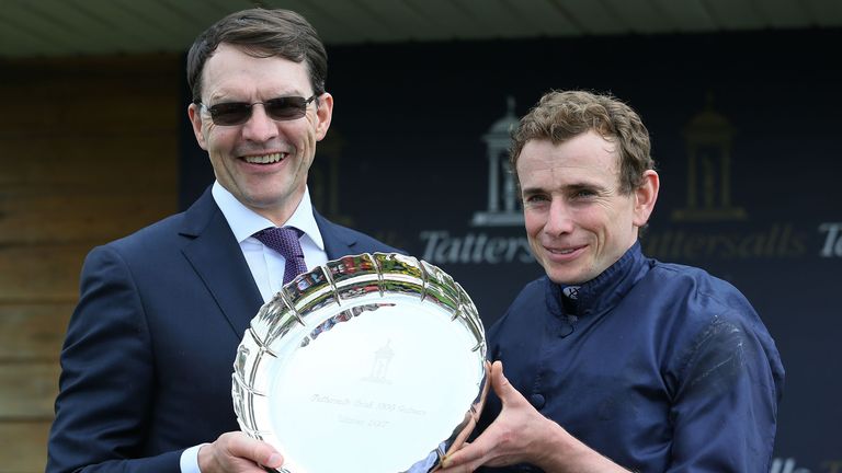 Jockey Ryan Moore and trainer Aidan O'Brien after winning the Tattersalls Irish 1,000 Guineas with Winter