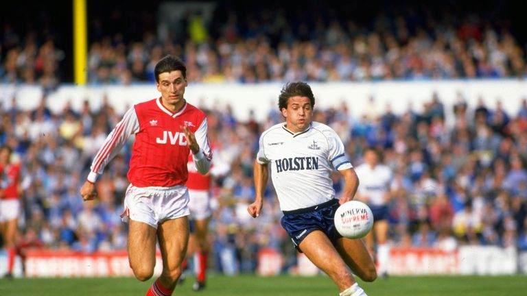 1988:  Alan Smith of Arsenal takes on Gary Mabbutt of Tottenham Hotspur during a match at White Hart Lane in London. Arsenal won the match 2-1. \ Mandatory