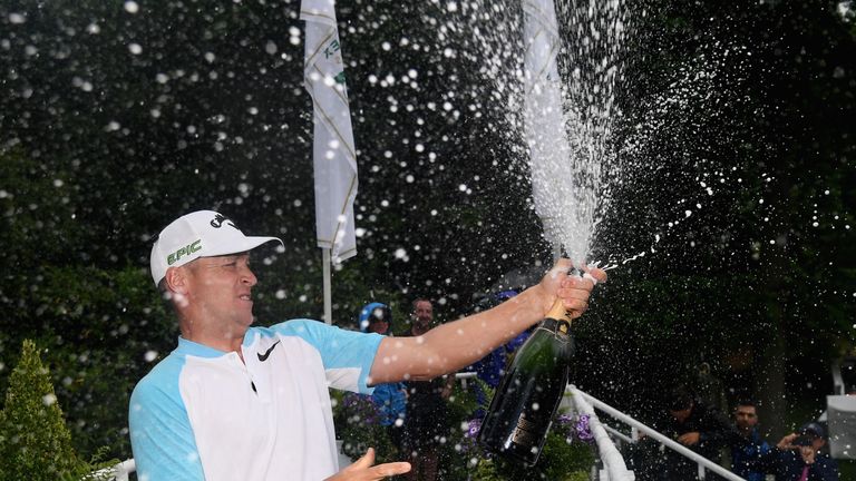 Alex Noren of Sweden celebrates winning the BMW PGA Championship at Wentworth