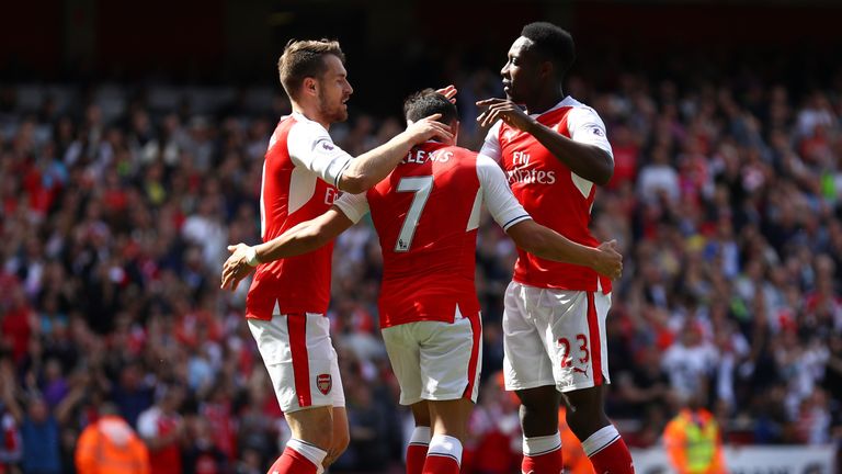 LONDON, ENGLAND - MAY 21:  Alexis Sanchez of Arsenal celebrates scoring his sides second goal with Aaron Ramsey of Arsenal and Danny Welbeck of Arsenal dur