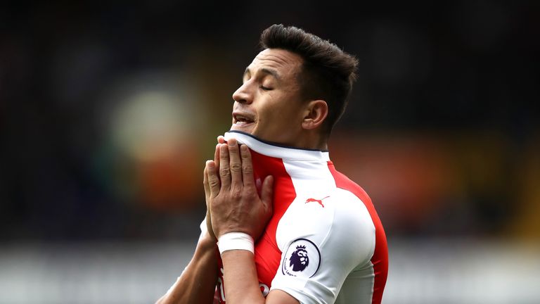 Alexis Sanchez reacts during the Premier League match between Tottenham Hotspur and Arsenal at White Hart Lane