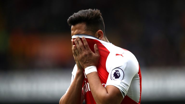 Alexis Sanchez reacts during the Premier League match between Tottenham Hotspur and Arsenal