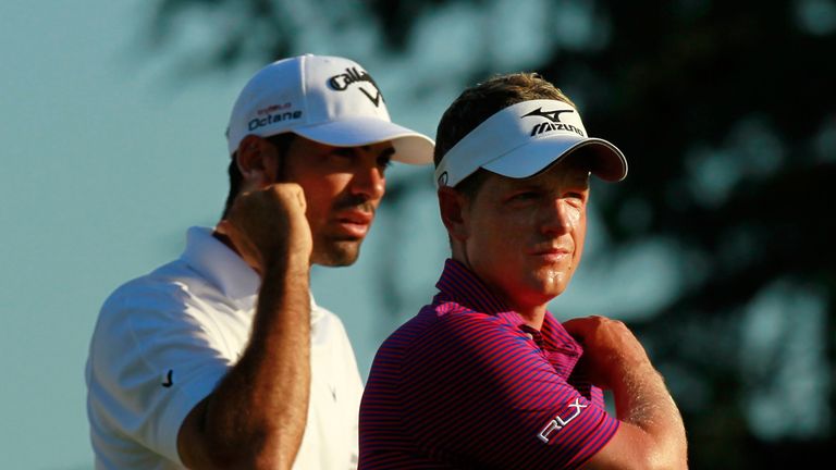 JOHNS CREEK, GA - AUGUST 11:  Alvaro Quiros (L) of Spain and Luke Donald of England look on from the tee box on the tenth hole during the first round of th