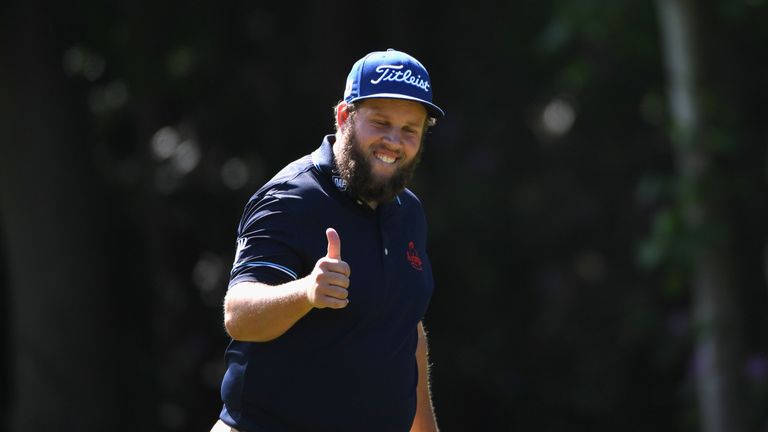 Andrew Johnston of England gives a thumbs up to the crowd on the 16th hole during day three of the BMW PGA Championship 