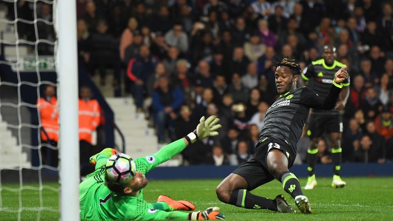 WEST BROMWICH, ENGLAND - MAY 12:  Michy Batshuayi of Chelsea scores his sides first goal past Ben Foster of West Bromwich Albion during the Premier League 