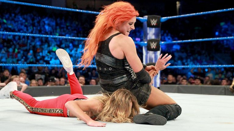 Becky Lynch made Carmella tap out to the arm bar.