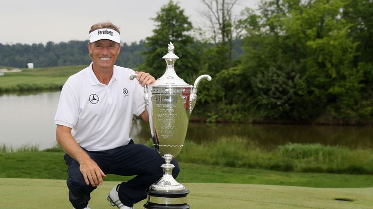 Bernhard Langer poses with the trophy after winning the Senior PGA Championship at Trump National Golf Club