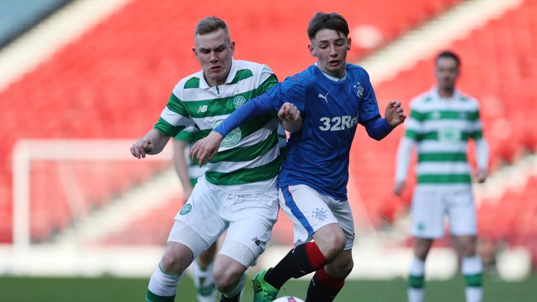 GLASGOW, SCOTLAND - APRIL 26:  Mark Hill of Celtic vies with Billy Gilmour of Rangers during The Scottish FA Youth Cup Final between Celtic and Rangers at 