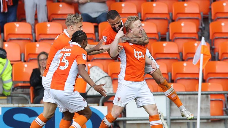 BLACKPOOL, ENGLAND - MAY 14: Mark Cullen of Blackpool  celebrates scoring his teams 2nd goal during the Sky Bet League Two match between Blackpool and Luto
