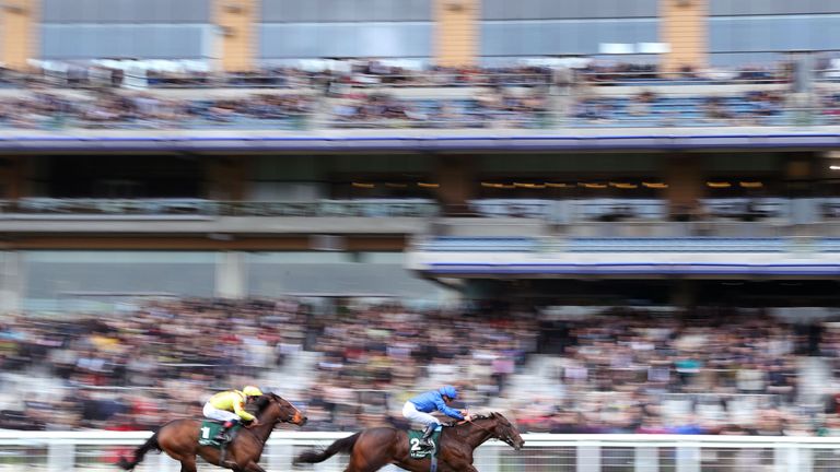 Blue Point ridden by jockey William Buick (right) on the way to winning the Merriebelle Stable Pavilion Stakes during the Discover Ascot Raceday at Ascot R