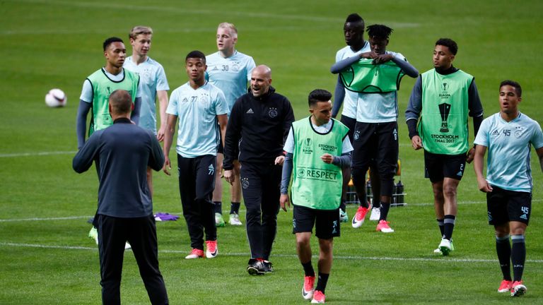 Bosz oversees an Ajax training session at the Friends Arena 