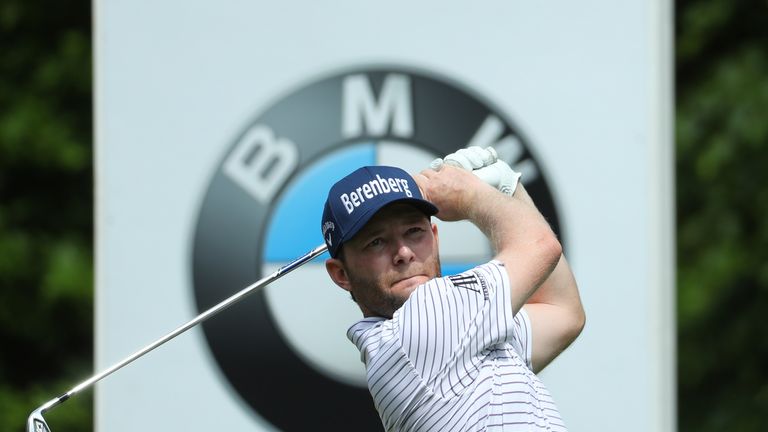 Branden Grace of South Africa tees off on the 5th hole during the final round on day four of the BMW PGA Championship 