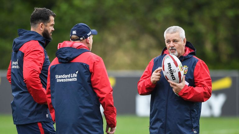 Warren Gatland in discussion with Lions coaches Andy Farrell and Neil Jenkins