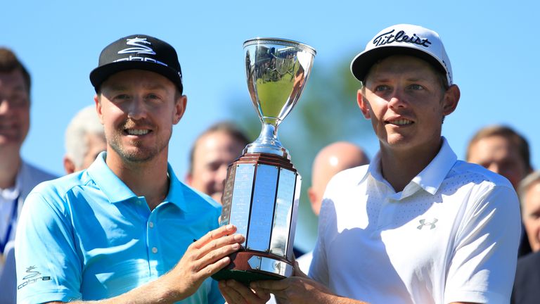 AVONDALE, LA - MAY 01:  Jonas Blixt of Sweden and Cameron Smith of Australia pose with the trophy after winning in a sudden-death playoff during a continua