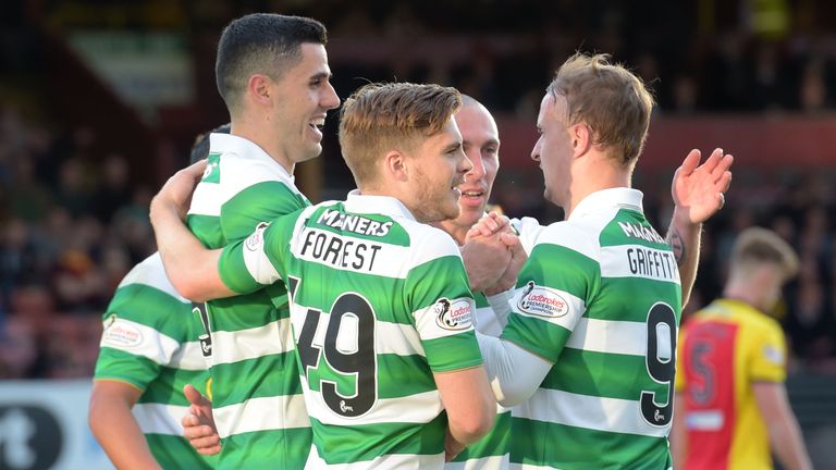 Celtic's Tom Rogic (left) celebrates with his team-mates after making it 2-0