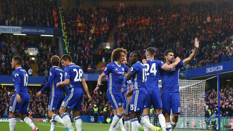 LONDON, ENGLAND - MAY 08:  Diego Costa of Chelsea celebrates with team mates after scoring his sides first goal during the Premier League match between Che