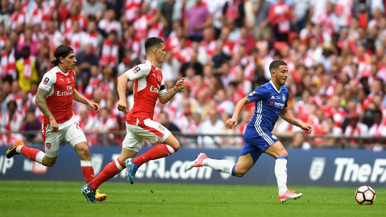 Eden Hazard of Chelsea gets away from Granit Xhaka of Arsenal during The Emirates FA Cup Final between Arsenal and Chelsea at Wembley