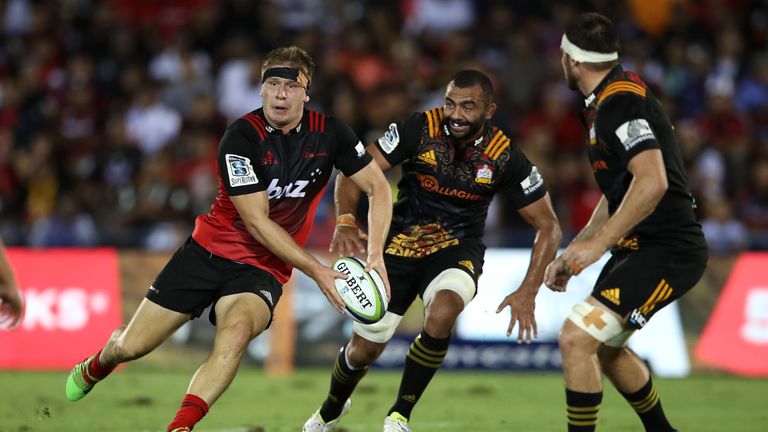 SUVA, NEW SOUTH WALES - MAY 19:  Jack Goodhue of the Crusaders shapes to pass during the round 13 Super Rugby match between the Chiefs and the Crusaders at
