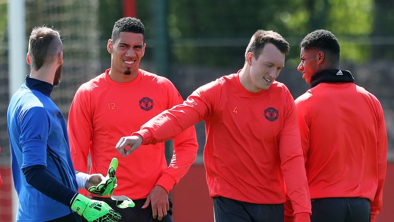 Chris Smalling and Phil Jones take part in training at  Manchester United's AON training complex