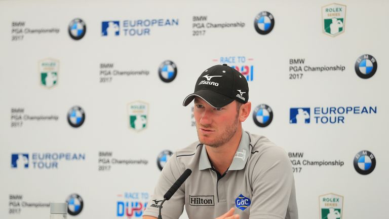 VIRGINIA WATER, ENGLAND - MAY 23:  Defending champion Chris Wood speaks to the media during a press conference ahead of the BMW PGA Championship at Wentwor